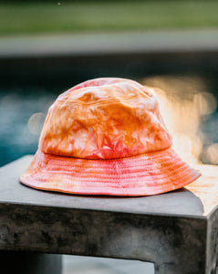 pink sunset ice-dyed bucket hat