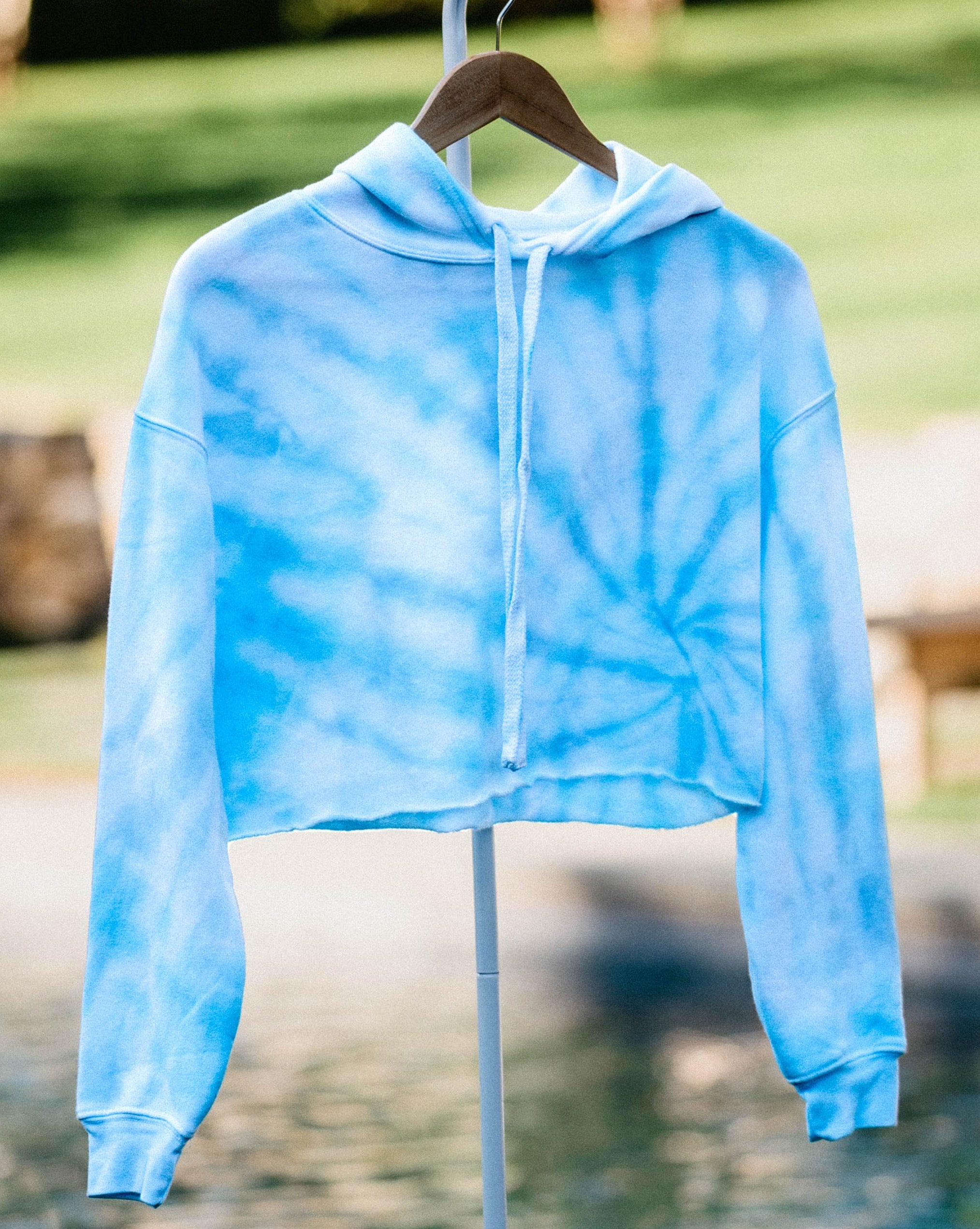 light blue swirl-dyed cropped hoodie