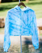 Load image into Gallery viewer, light blue swirl-dyed cropped hoodie
