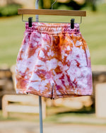 Load image into Gallery viewer, pink sunset ice-dyed sweat shorts
